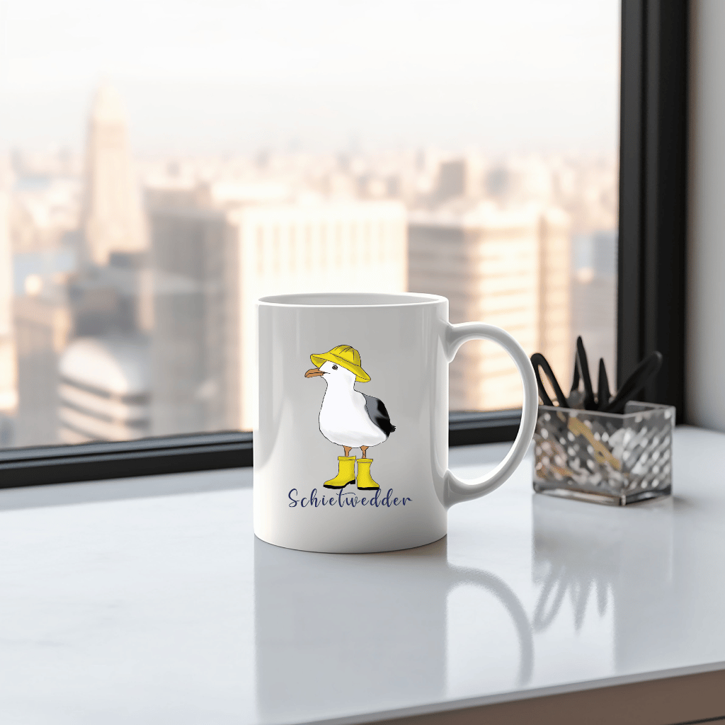 Maritime Kaffeetasse: Möwe im Regenmantel mit Schietwedder-Schriftzug