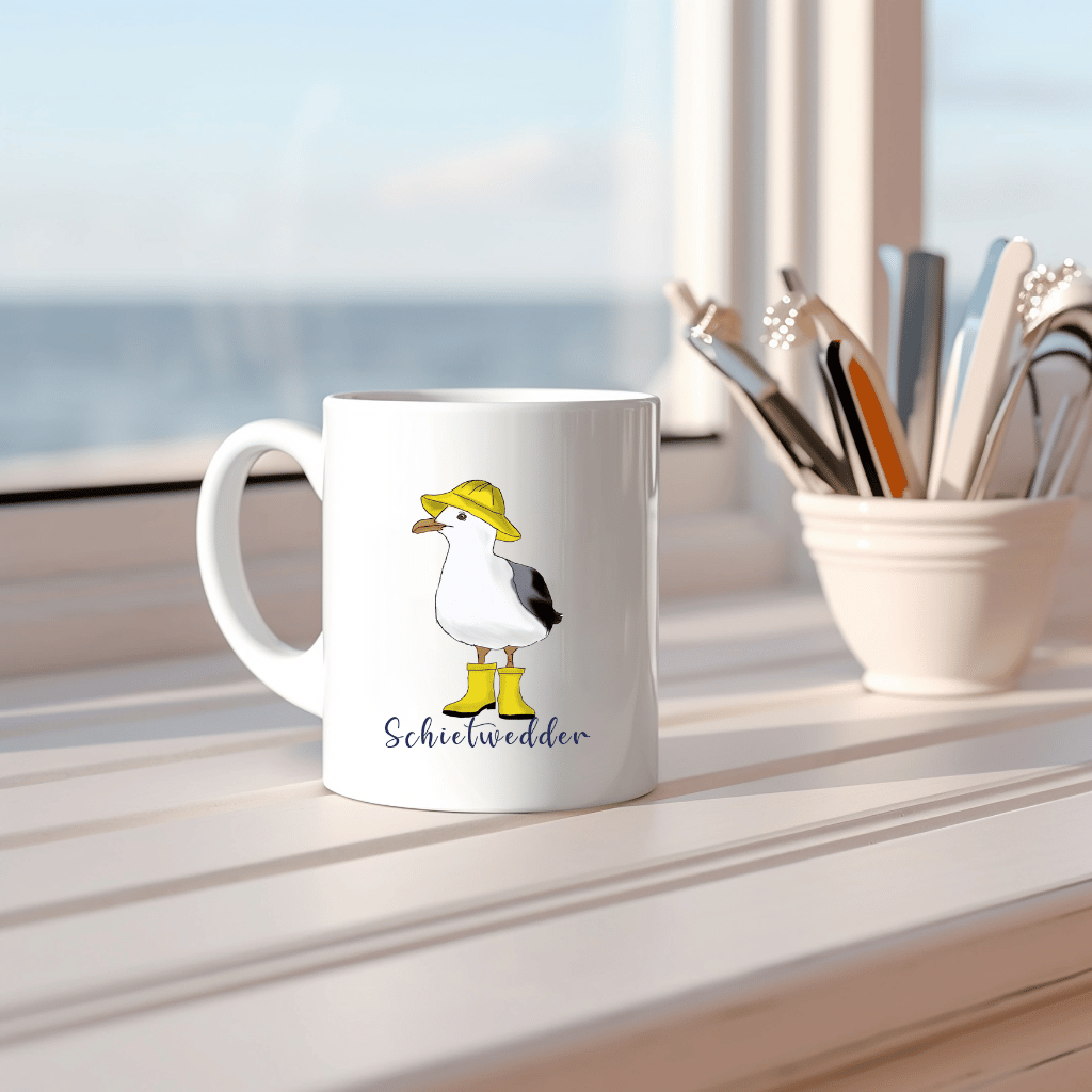 Maritime Kaffeetasse: Möwe im Regenmantel mit Schietwedder-Schriftzug